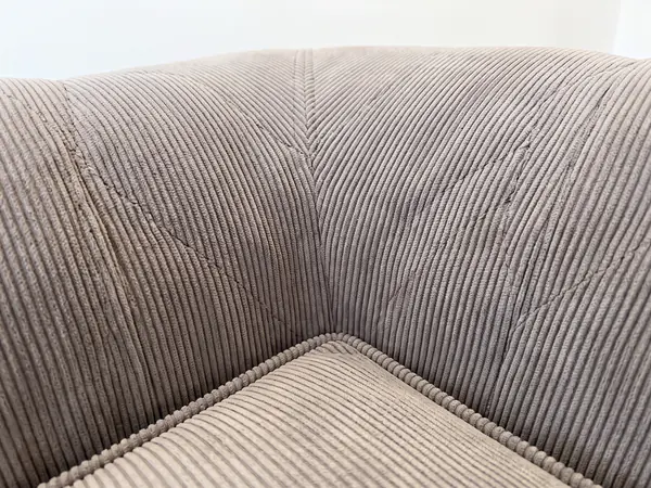 Detalle del capitoné de un sillón chesterfield